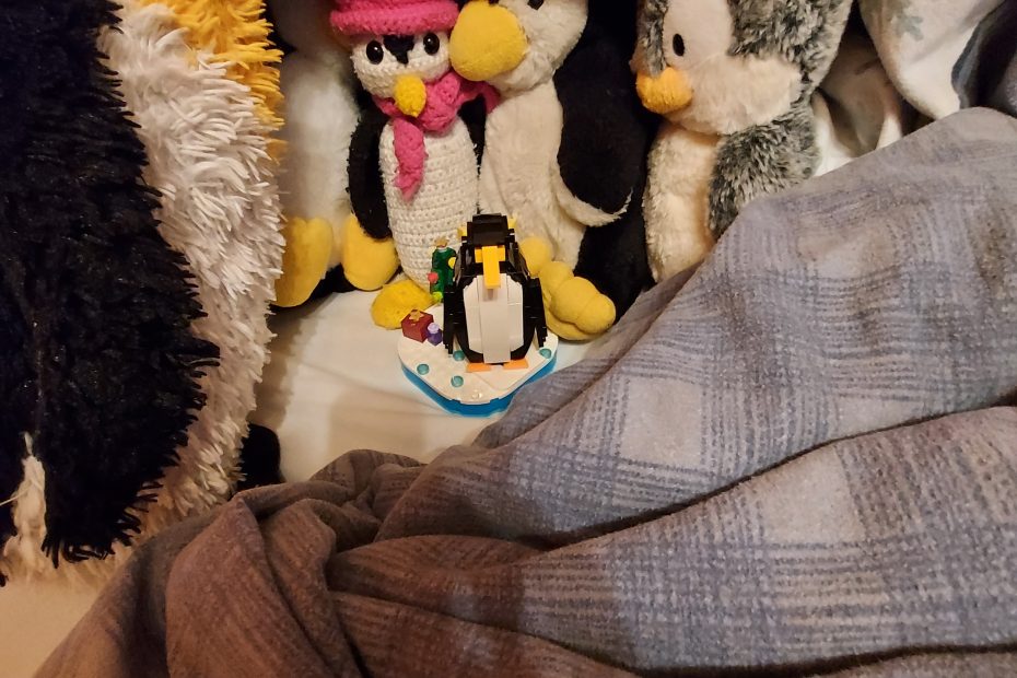 Pinguin-WG im Bett zu Weihnachtsabend